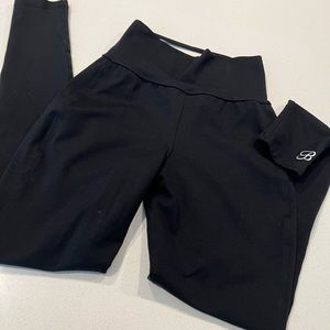 Bombshell black leggings with criss cross back